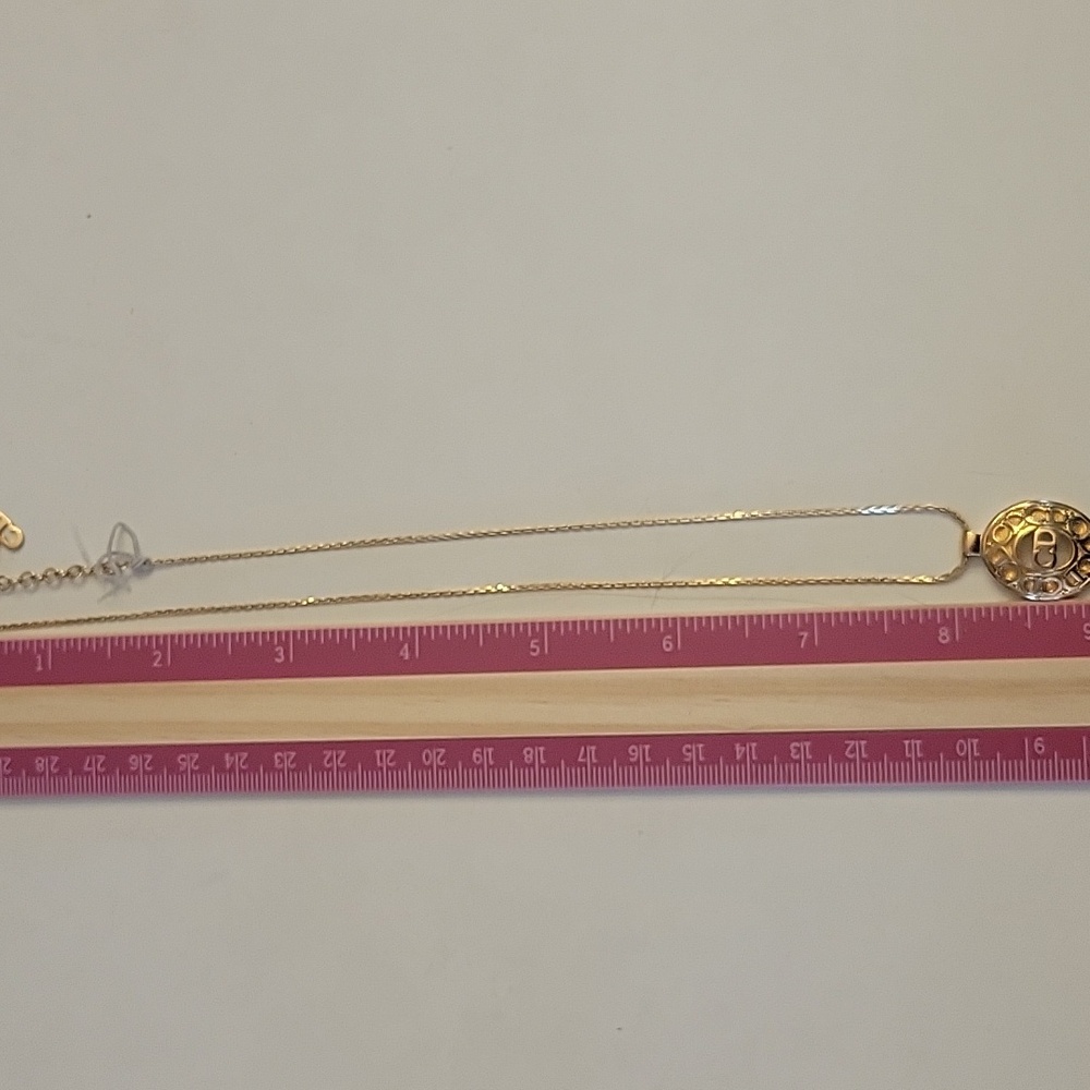 Dior Gold Necklace with Intricate Pendant Design